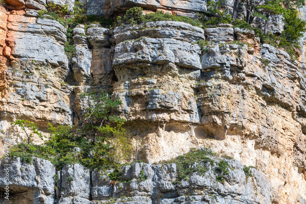 Layered cliff face in the canyon, close up view.