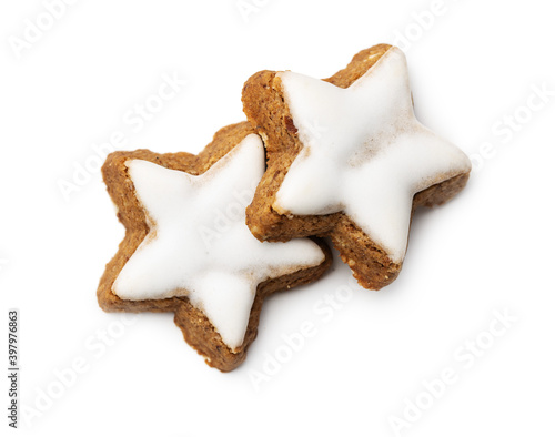 Icing gingerbread stars. Traditional Christmas cookies.