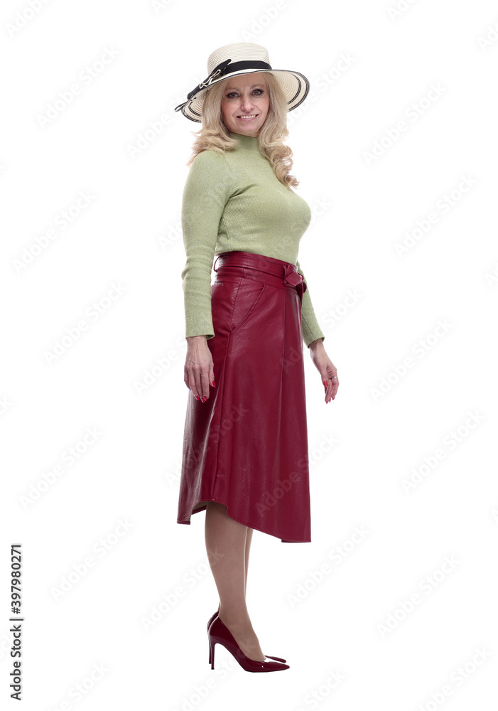 smiling woman in a summer hat striding forward smiling woman in a summer hat striding forward