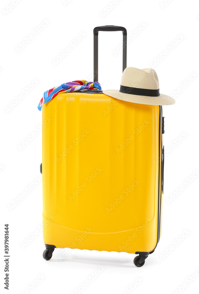Packed suitcase and hat on white background Packed suitcase and hat on white background