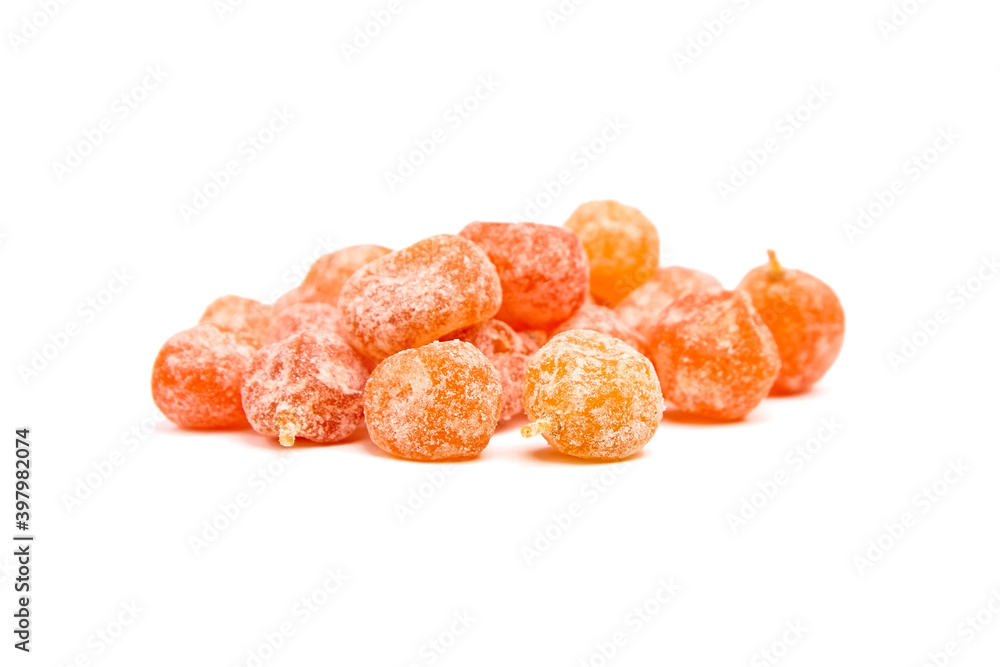 Candied fruits, heap of dried kumquats isolated on white background Candied fruits, heap of dried kumquats isolated on white background