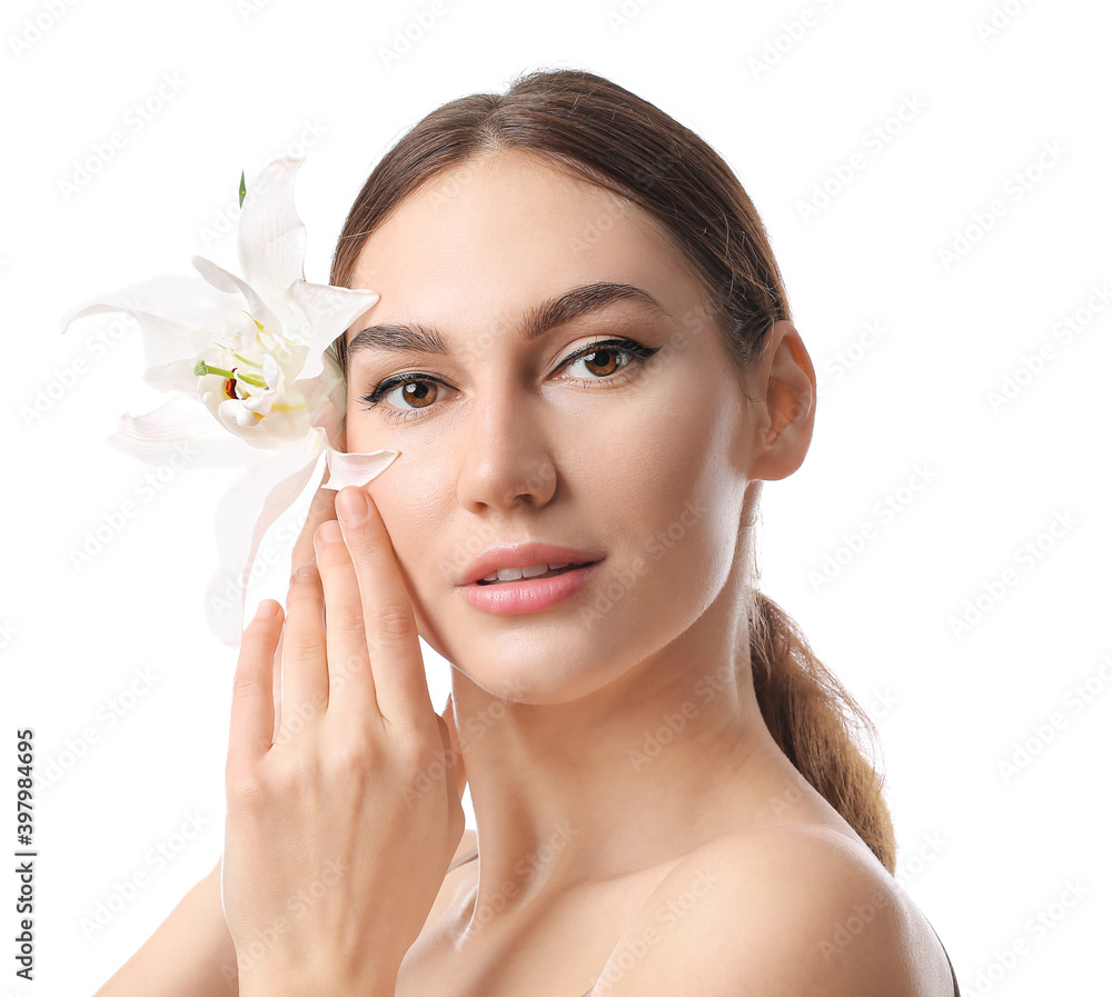 Beautiful young woman with fresh lily on white background Beautiful young woman with fresh lily on white background