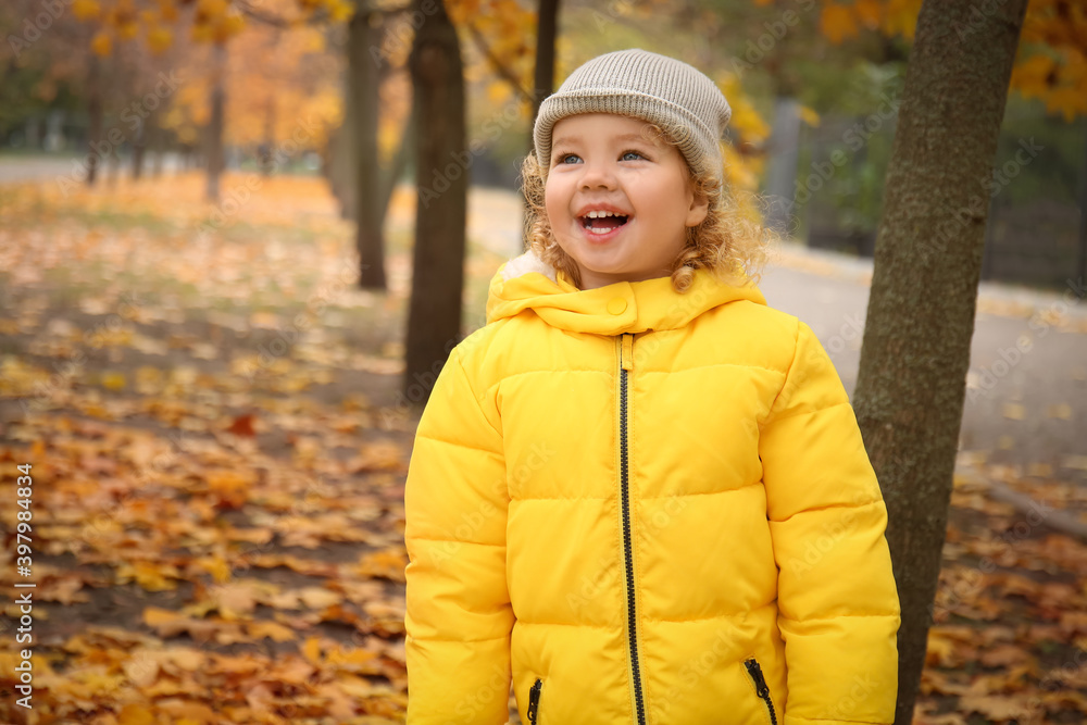 Cute little girl in autumn park Cute little girl in autumn park