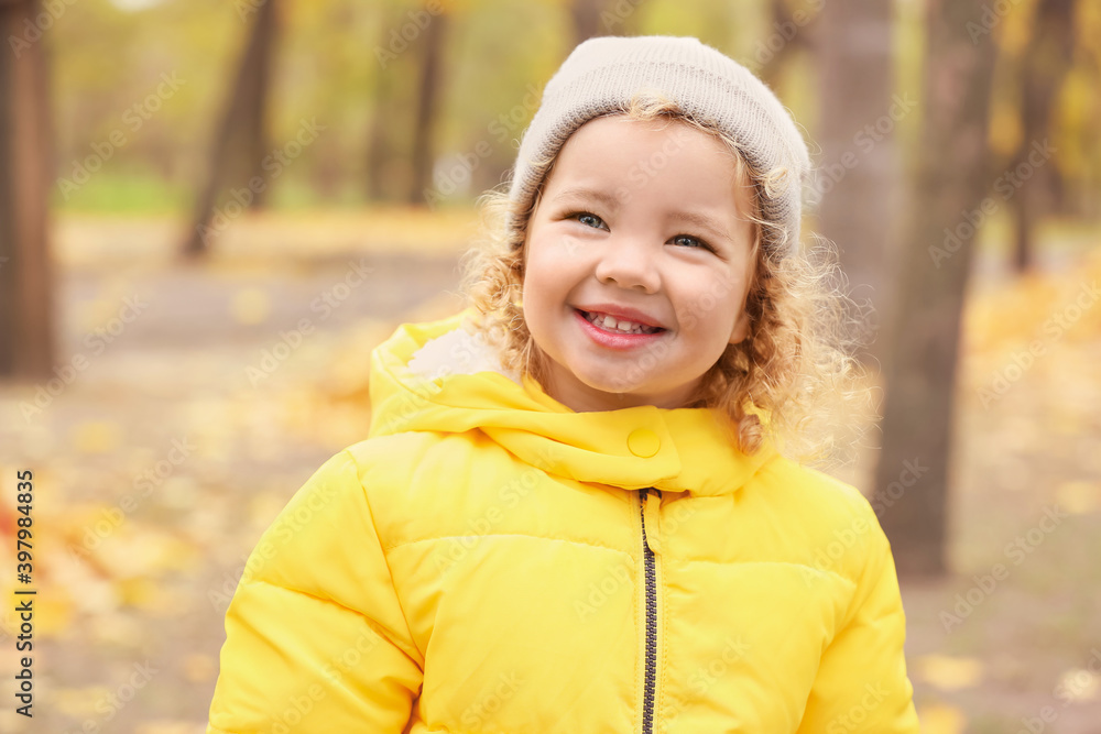 Cute little girl in autumn park Cute little girl in autumn park
