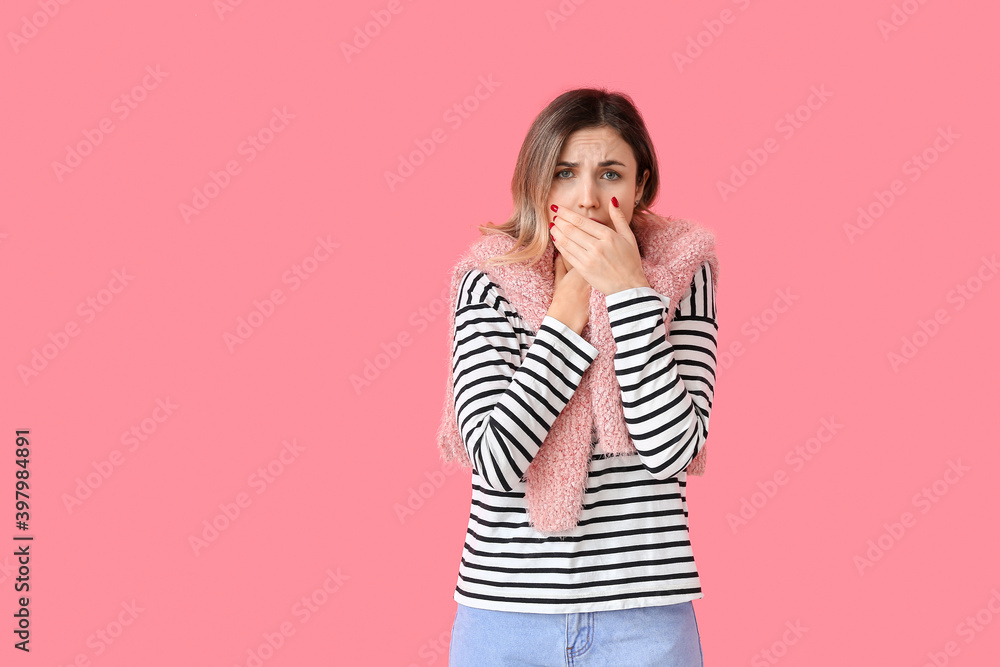 Coughing young woman on color background Coughing young woman on color background