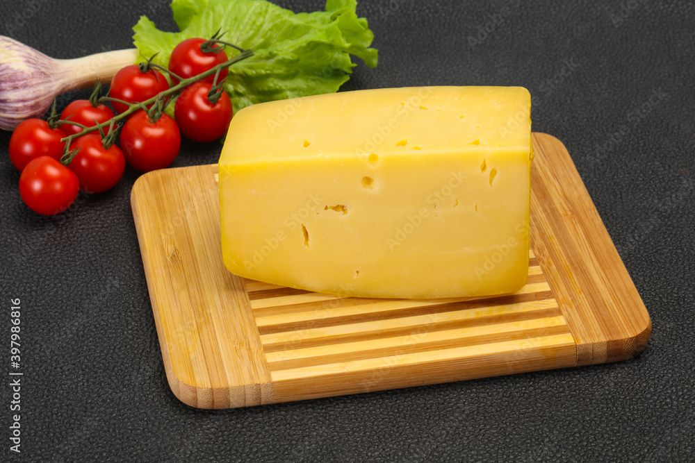 Hard yellow tasty cheese brick Hard yellow tasty cheese brick