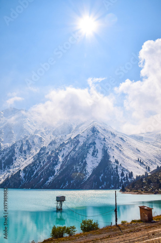 Stunning Big Almaty Lake in Kazakhstan. The Big Almaty Lake is natural alpine reservoir. It is located in the Trans-Ili Alatau mountains