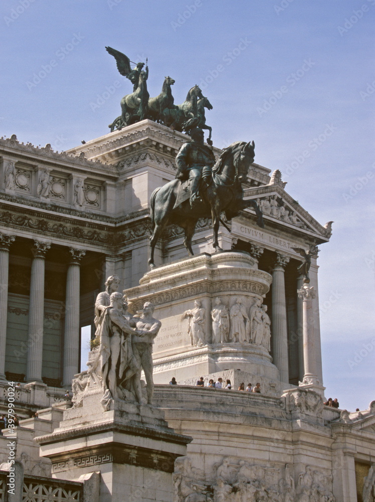 View of Victor Emmanuel II Monument under blue sky at Piazza Venezia, Rome, Italy.