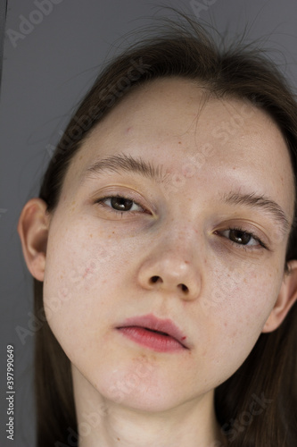 Close-up emotional portrait of young woman