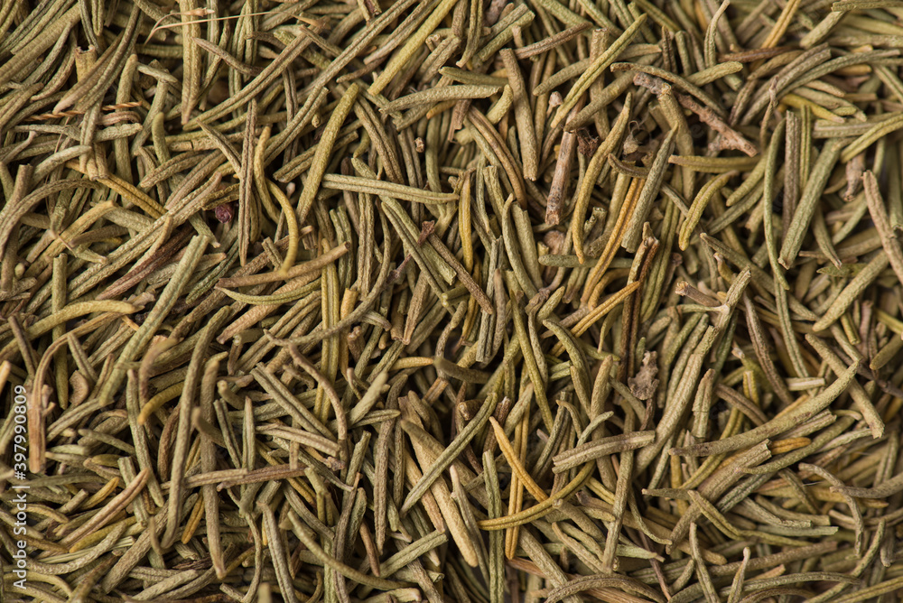 Close up view photo image of textured backdrop made of dried rosemary spice Close up view photo image of textured backdrop made of dried rosemary spice