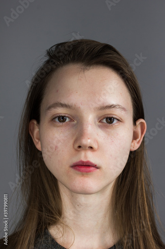 Close-up emotional portrait of young woman