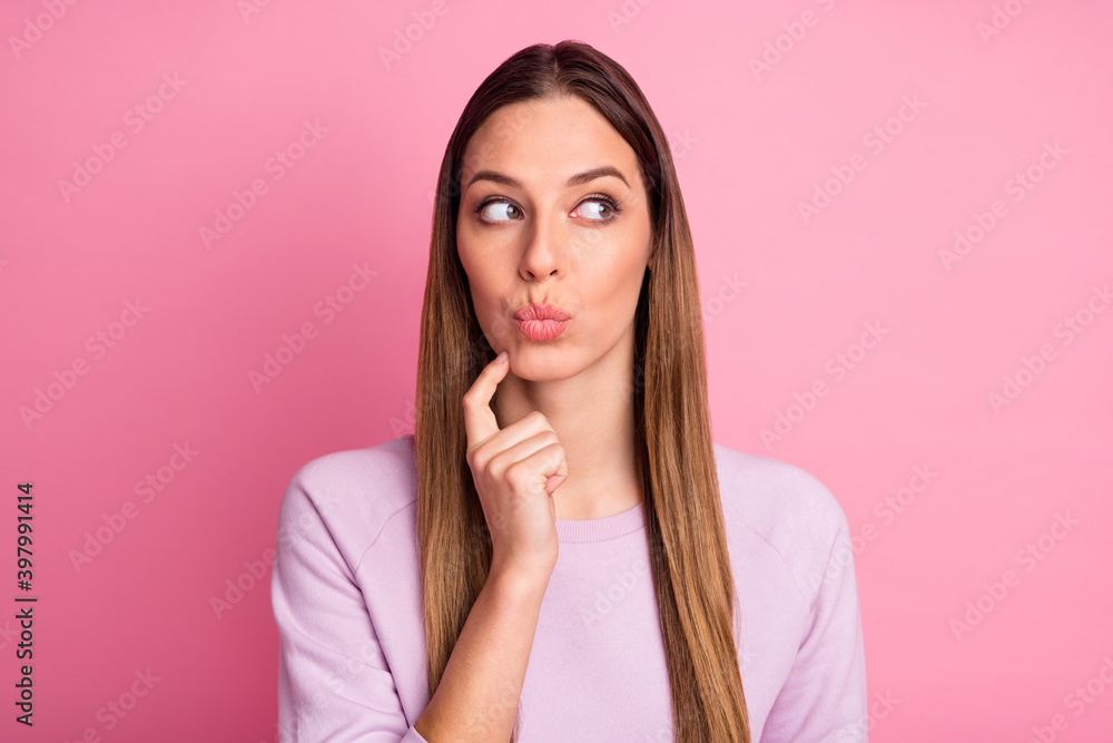 Close-up portrait of lovely smart clever straight-haired girl solving task issue pout lips isolated over pink pastel color background Close-up portrait of lovely smart clever straight-haired girl solving task issue pout lips isolated over pink pastel color background