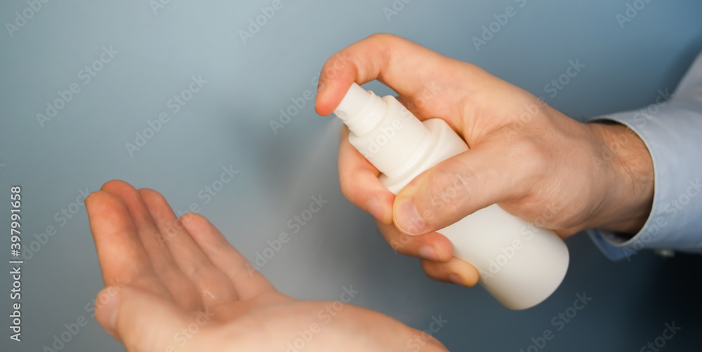 Close up of person pressing on sanitizer. Covid 19, medical concept Close up of person pressing on sanitizer. Covid 19, medical concept