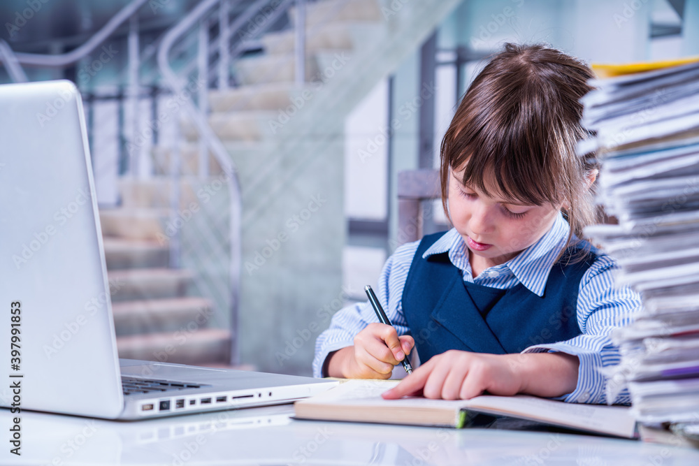 Young business girl working with documents in office. Humorous image. Young business girl working with documents in office. Humorous image.