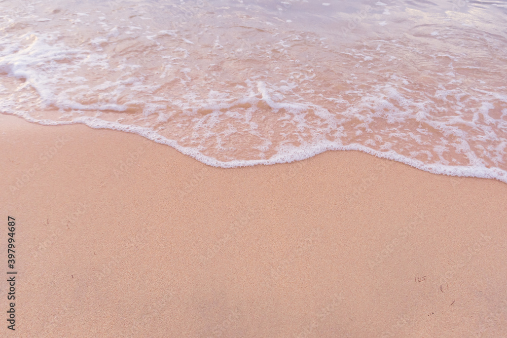 Soft wave of blue ocean on sandy beach Soft wave of blue ocean on sandy beach