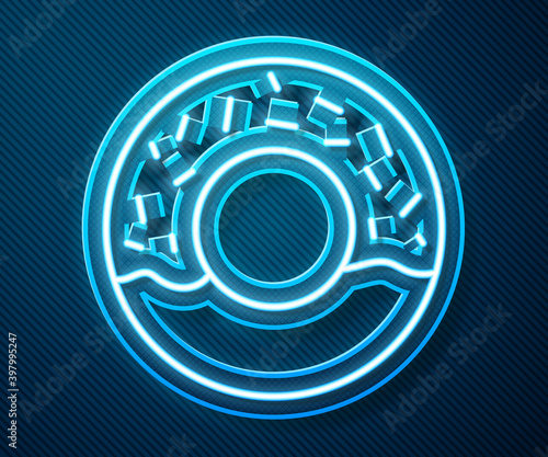Glowing neon line Donut with sweet glaze icon isolated on blue background. Vector.