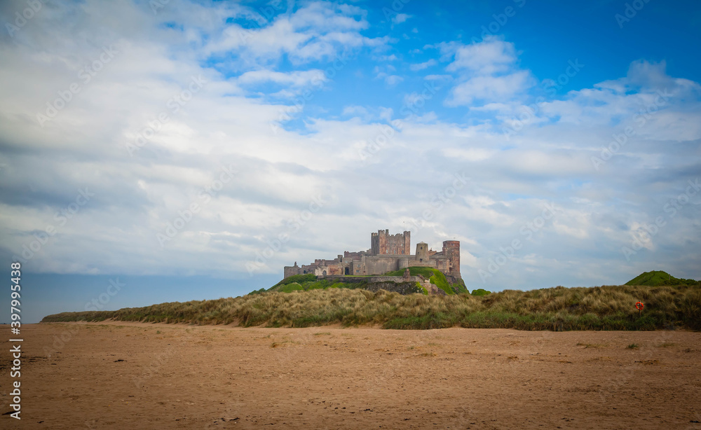 Bamburgh Castle on the beach of Northumberland,  United Kingdom