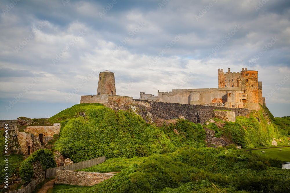 Bamburgh Castle on the beach of Northumberland,  United Kingdom