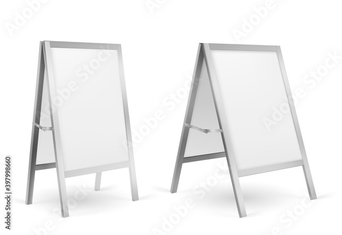 Pavement sign, blank sidewalk advertising stand isolated on white background. Vector realistic mockup of white sandwich board in metal frame, handheld banner for menu, ad or announcement photo