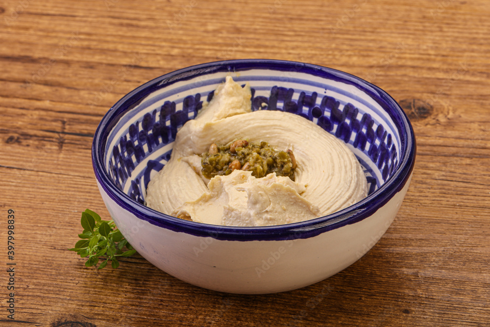 Vegan food - hummus with olive oil Vegan food - hummus with olive oil