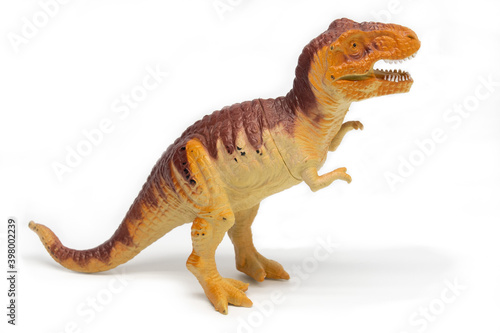 Tyrannosaurus plastic model toy in white background © Narayan