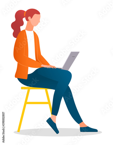 Woman sitting on the stool and working with laptop in social networks isolated on white. Redheaded female character on the chair in casual clothes holding computer on her knees typing on the keyboard