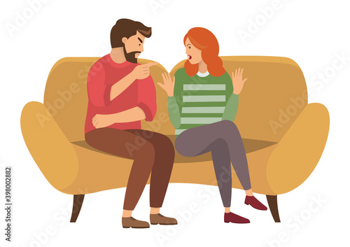 A man and a woman are sitting on a large yellow sofa. A couple of people quarrels sitting on the couch. Angry man points finger and yells at girl. Redhead girl is raising her hands in indignation