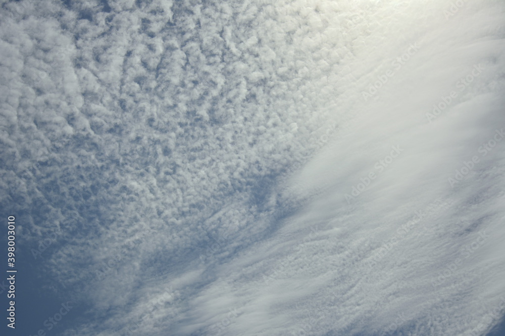 Ravda, Bulgaria. May 28 2014. White cirrus clouds in blue sky in sunlight.