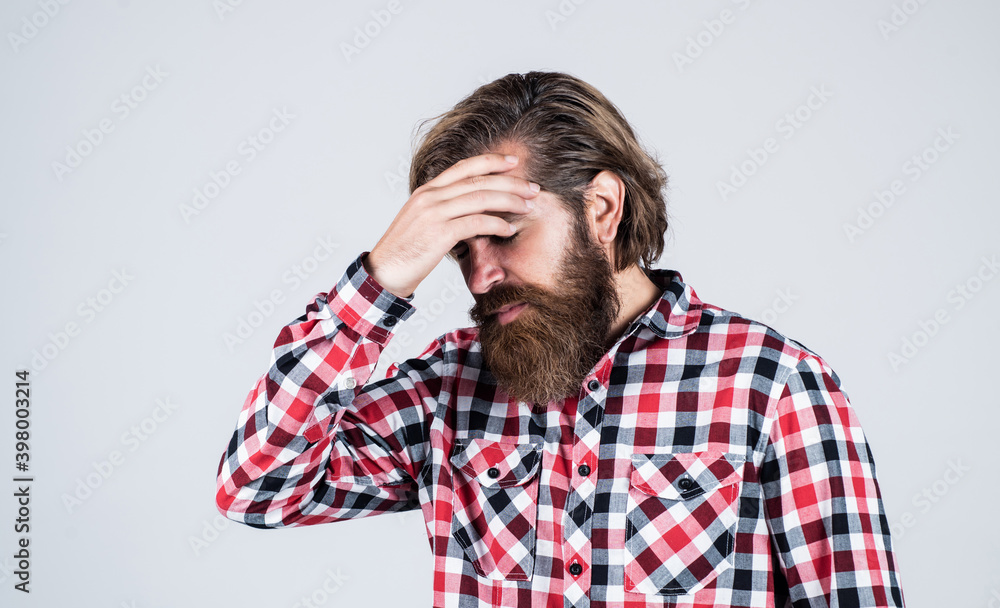 Caucasian tired mature hipster with trendy hairstyle in checkered shirt, headache Caucasian tired mature hipster with trendy hairstyle in checkered shirt, headache