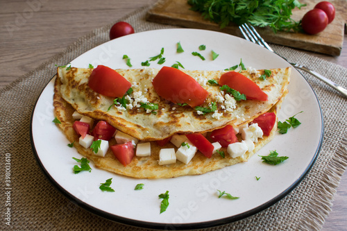 Cheese and Tomatoes in Homemade Delicious crepe