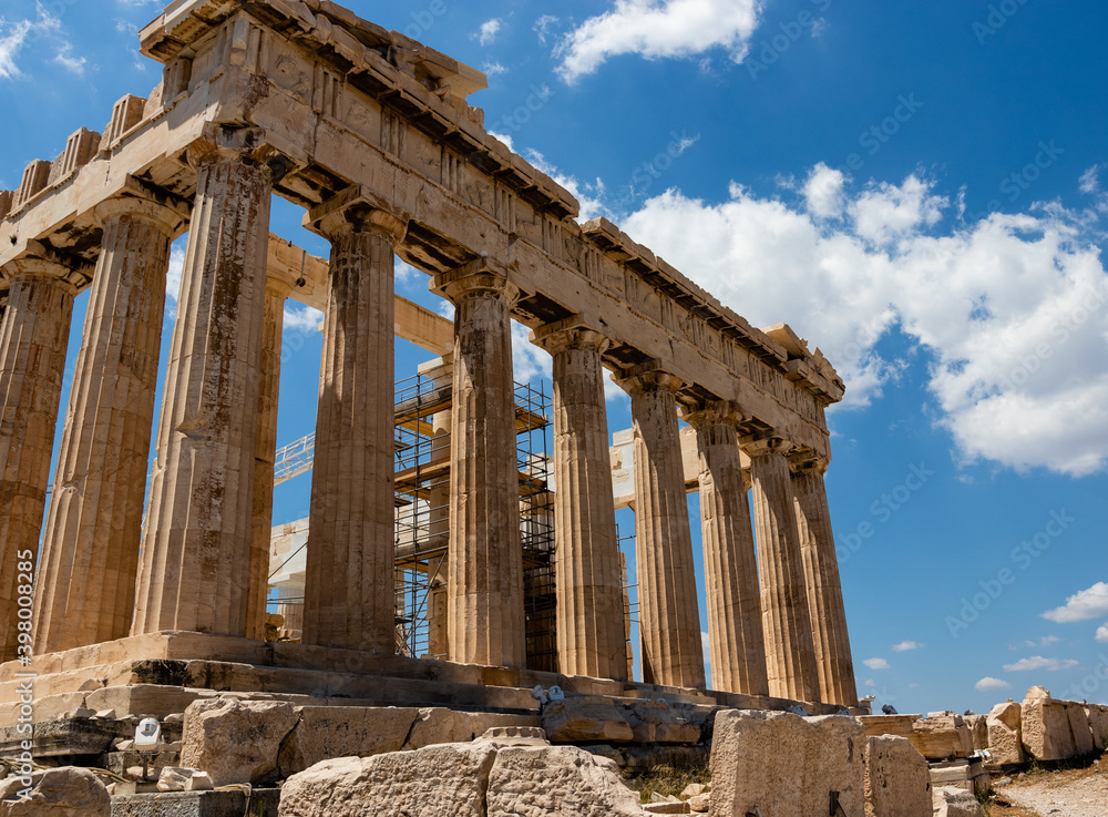 Obraz premium Athenian pantheon close up. Columns of the Athenian pantheon. Marble columns of an ancient temple. Ancient Roman architecture preserved to this day