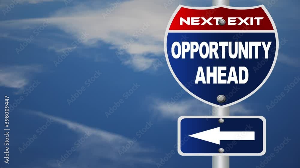 Opportunity ahead road sign with time-lapse cloud background Opportunity ahead road sign with time-lapse cloud background