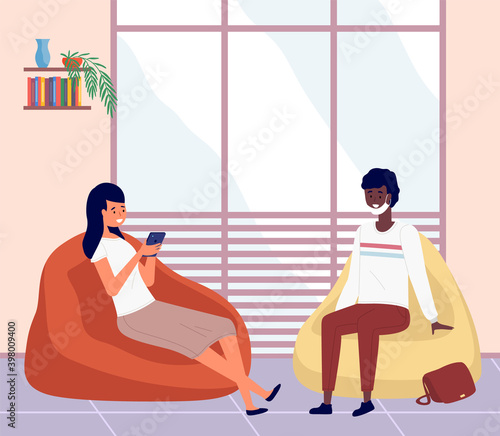 A girl with a phone sits on a soft pouf. African american man in medical mask talking to a woman. Female character chatting or watching news on her smartphone. Guy communicates with his friend