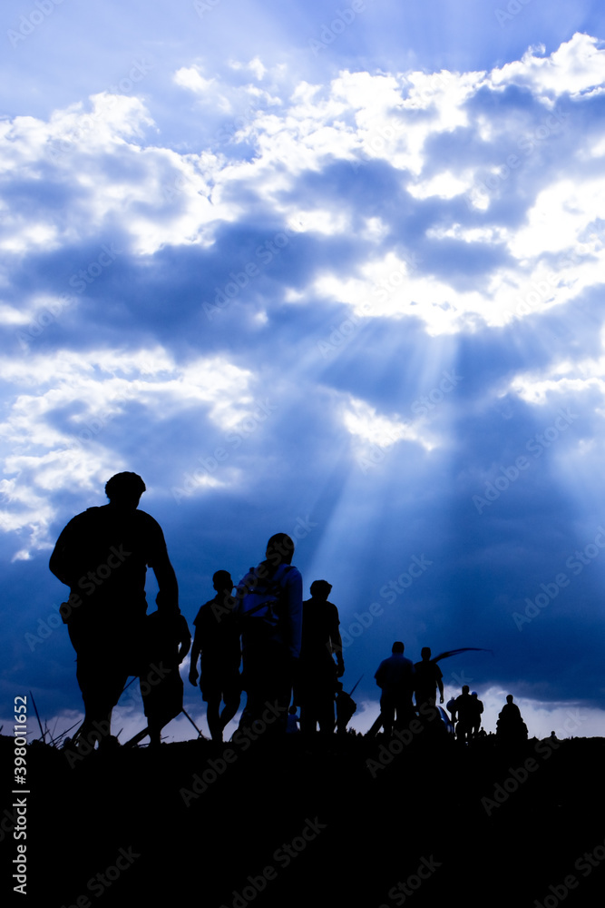 Silhouette of the emigrants on the way Silhouette of the emigrants on the way