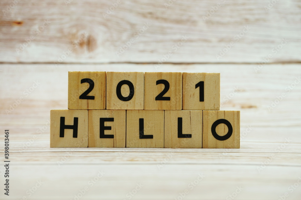 Hello 2021 alphabet letter on wooden background Hello 2021 alphabet letter on wooden background