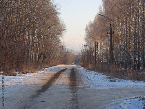 An old, abandoned alley, street. Early winter. Trees. Winter landscape. Russian winter nature. Russia, Ural, Perm region