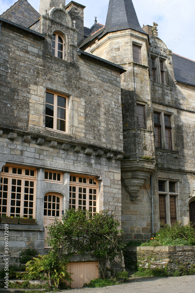 stone mansion and house in rochefort-en-terre in brittany (france)