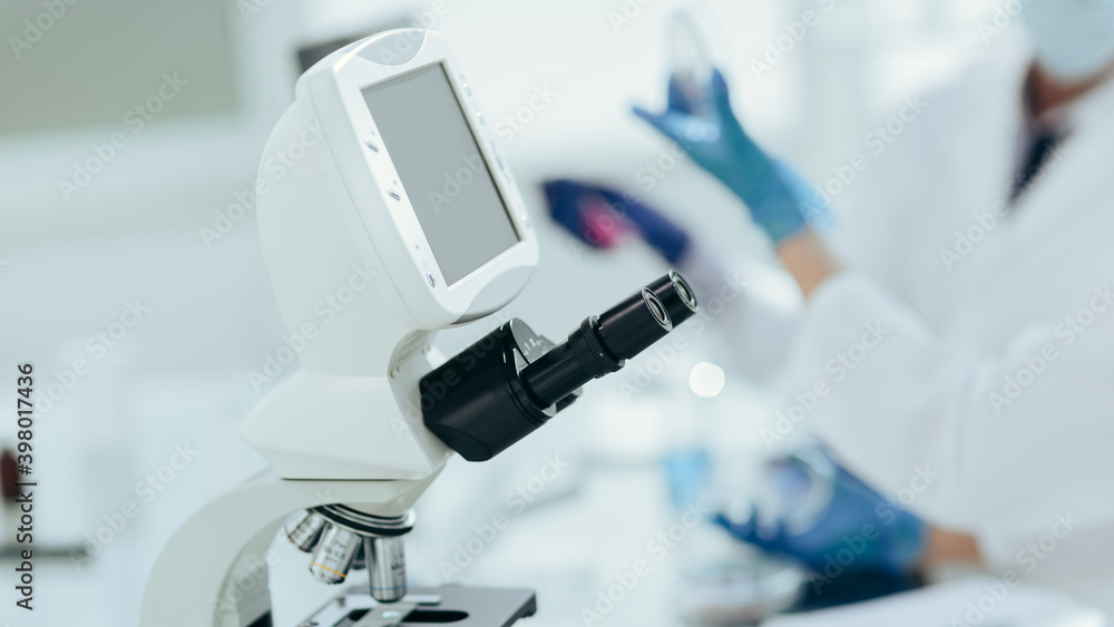 close up. image of a microscope in a medical laboratory. close up. image of a microscope in a medical laboratory.