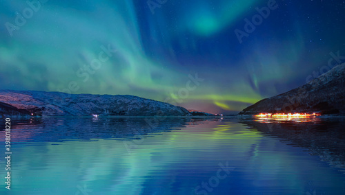 Wallpaper Mural Northern lights (Aurora borealis) in the sky over Tromso, Norway Torontodigital.ca