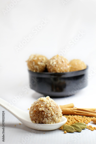  Inidan traditional sweet Fenugreek laddu or methi ke laddu or methi ki pinni made from Fenugreek seeds,jaggery,edible gum,wheat flour and desi ghee. photo