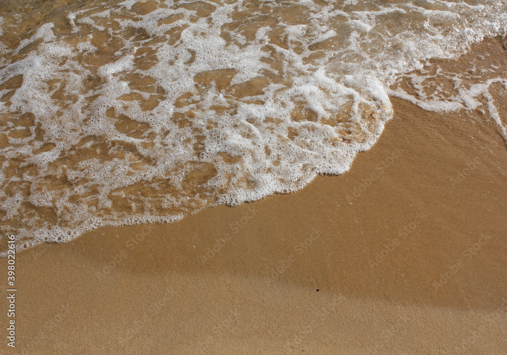 Sand beach and spume Sand beach and spume