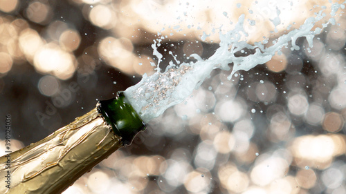 Detail of champagne wine splashing from bottle