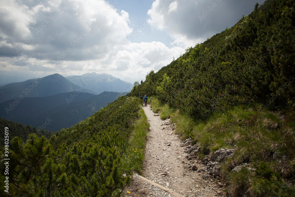 Hiker at Herzogstand mountain in Bavaria, Germany Hiker at Herzogstand mountain in Bavaria, Germany