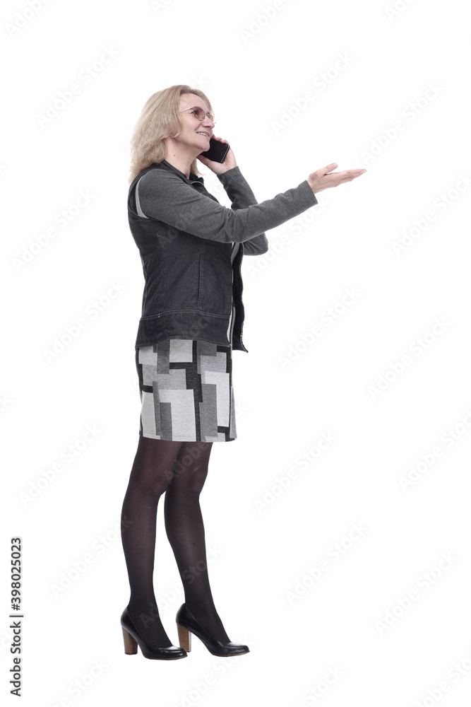 young woman with a smartphone reading an ad. isolated on a white young woman with a smartphone reading an ad. isolated on a white