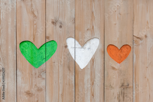 Republic of Ireland flag colors carved into wooden love hearts