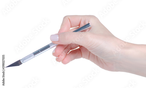 Scalpel precision knife in hand on white background isolation