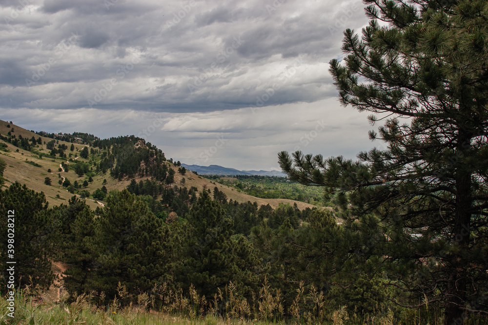 Scenic view of the large mountains on a cloudy summer day. Settlers park, Boulder, Colorado, USA. Denver