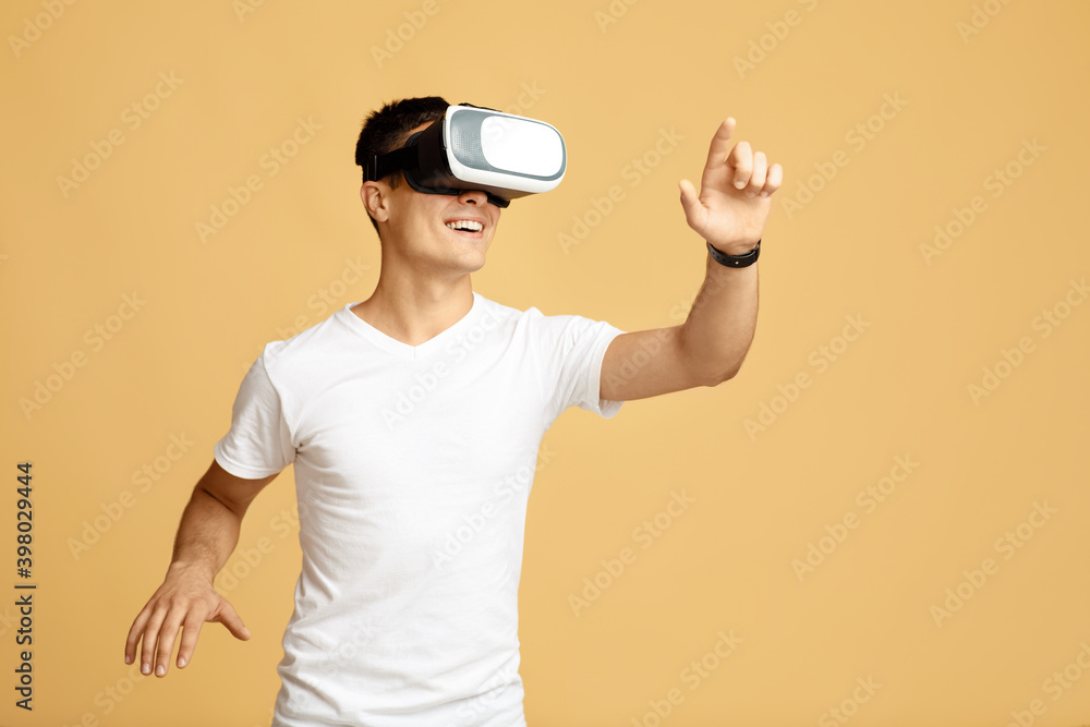 Man have fun with virtual reality headset Man have fun with virtual reality headset
