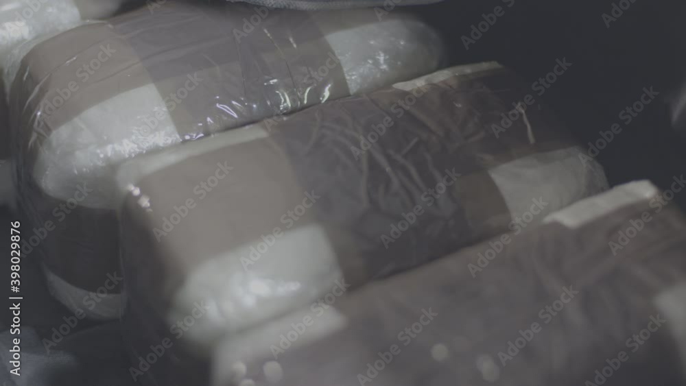 Close up of Cocaine Bags in Black Bag
