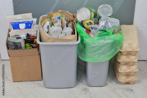 Various garbage for recycling in box. Paper, cardboard, metal and glass prepared for recycling. Waste to be recycled. Trash for recycle and reduce ecology environment.